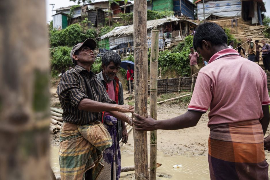 Rohingya Men participating in Shelter Construction activities