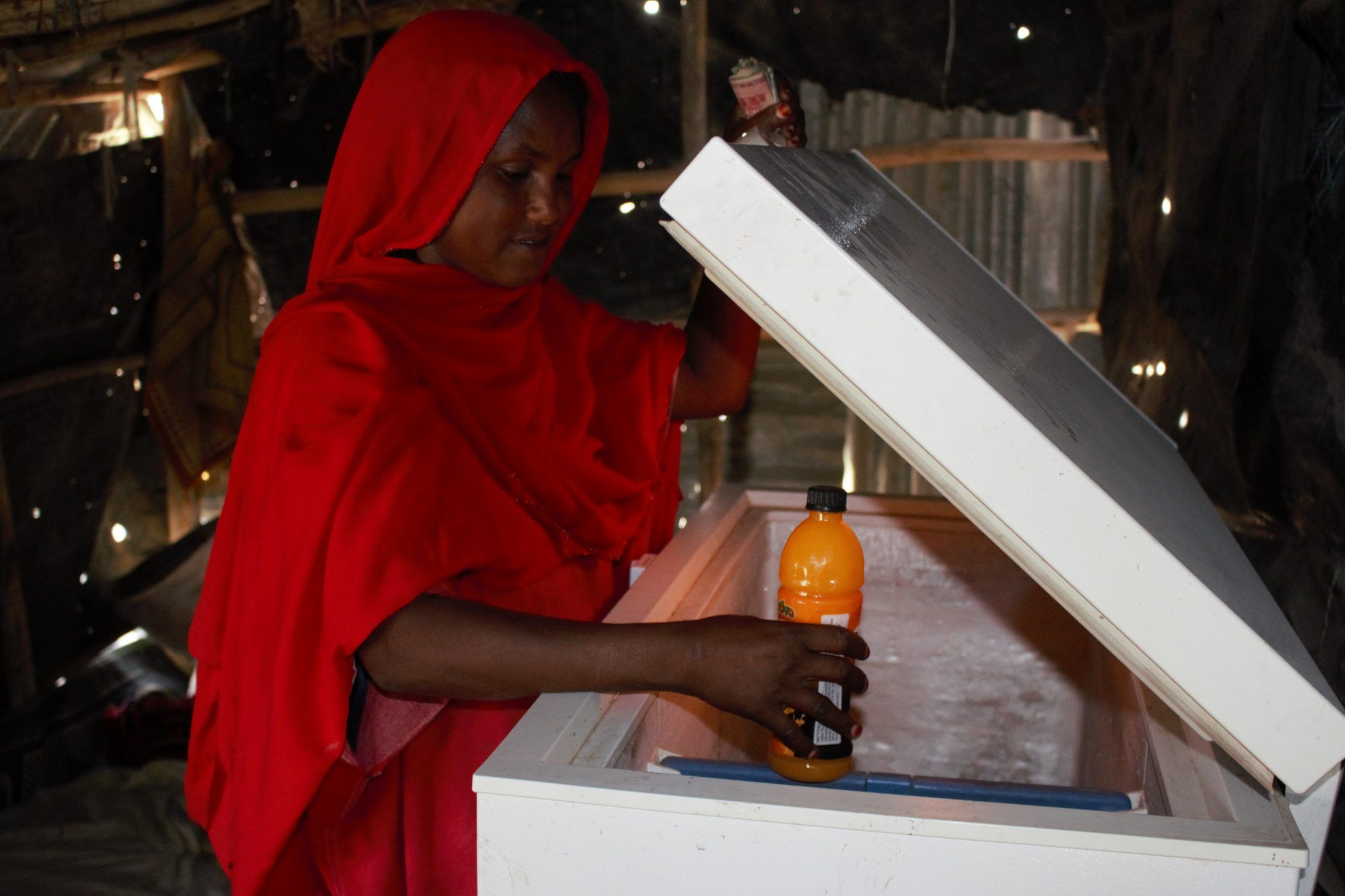 After the refugee camp was connected to the national power grid, Etleni's family quickly invested in a freezer from which they sell cold beverages