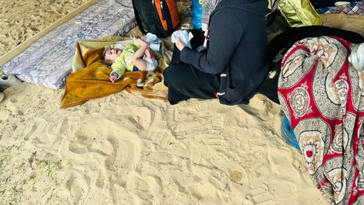 Aya, Woman form Gaza, with her baby Yomna.