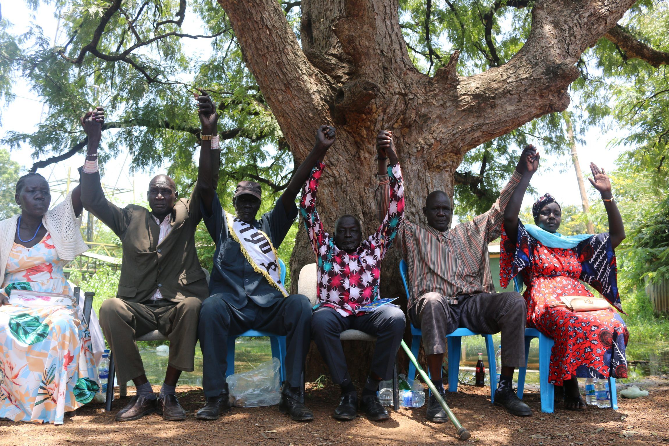 Members of the peace committee pledge to work hard towards building bridges of peace.